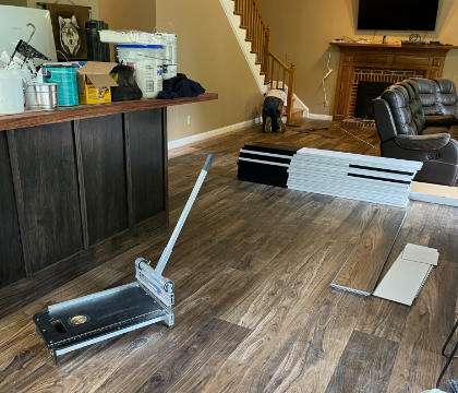 Pergo Extreme Preferred Wider Longer being installed into a residential living room
